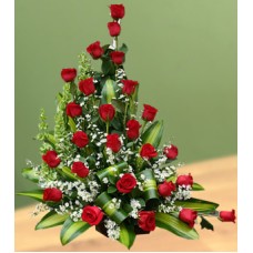 Floral arrangement roses in basket